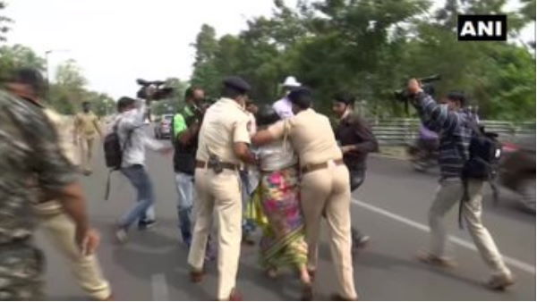 Woman attempts self immolation outside Odisha Assembly Police took her to a hospital Woman attempts self immolation outside Odisha Assembly Police took her to a hospital