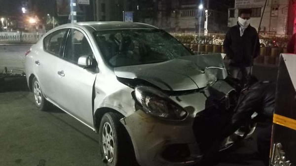 a high speed car hits the bike in rajkot amidst night curfew a high speed car hits the bike in rajkot amidst night curfew