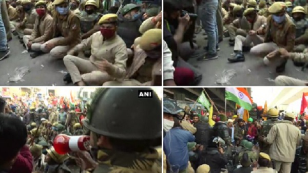 किसानों को रोकने के लिए नांगलोई में सड़कों पर बैठा पुलिस दल किसानों को रोकने के लिए नांगलोई में सड़कों पर बैठा पुलिस दल