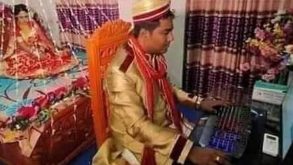 शादी की रात बिस्तर पर इंतजार कर रही थी दुल्हन, दूल्हा करने लगा कंप्यूटर पर फोटो अपलोड, बोला- Hold On Babe शादी की रात बिस्तर पर इंतजार कर रही थी दुल्हन, दूल्हा करने लगा कंप्यूटर पर फोटो अपलोड, बोला- Hold On Babe