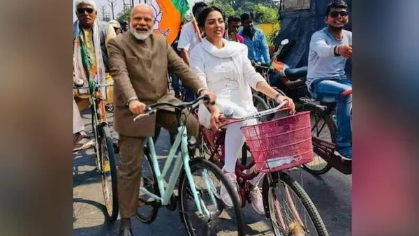 Fact Check viral photo of PM Modi riding bicycle along with Pamela Goswami, fake photo Fact Check viral photo of PM Modi riding bicycle along with Pamela Goswami, fake photo