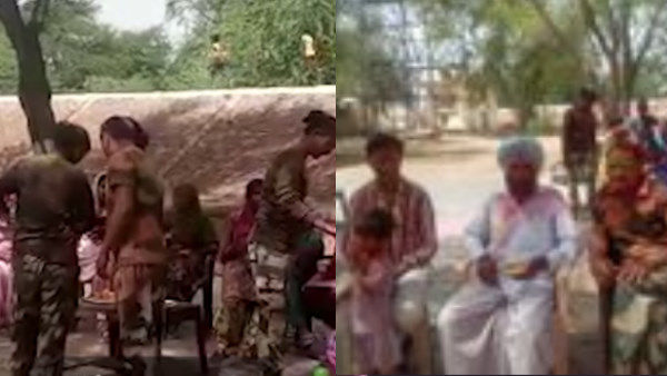 BSF jawans celebrate Holi with villagers at Rajasthan border BSF jawans celebrate Holi with villagers at Rajasthan border