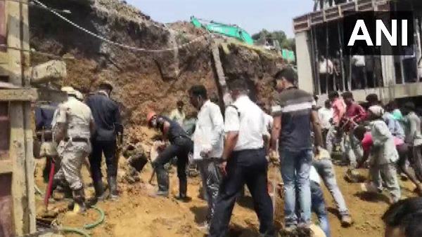 wall of under construction building collapsed in Surat wall of under construction building collapsed in Surat