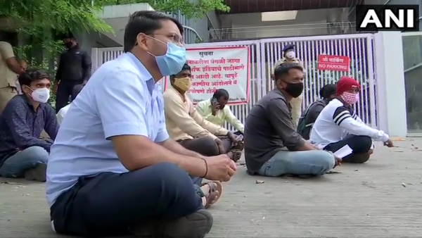 Maharashtra COVID19 patients Relatives sit on protest outside Collector office in pune demanding Remdesivir Maharashtra COVID19 patients Relatives sit on protest outside Collector office in pune demanding Remdesivir