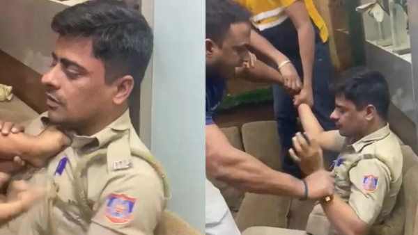 Fact Check is Bengal BJP workers assaulting Delhi police cop video goes viral Fact Check is Bengal BJP workers assaulting Delhi police cop video goes viral