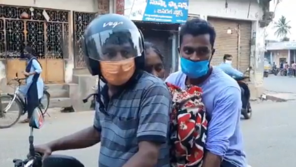 शव को बाइक पर रखकर गांव पहुंचा बेटा