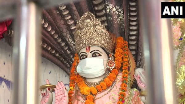 kanpur temple Idols get face masks due to COVID 19 scare kanpur temple Idols get face masks due to COVID 19 scare