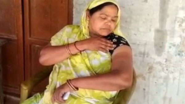 Nurse administer double dose of Coronavirus vaccine on a woman Nurse administer double dose of Coronavirus vaccine on a woman