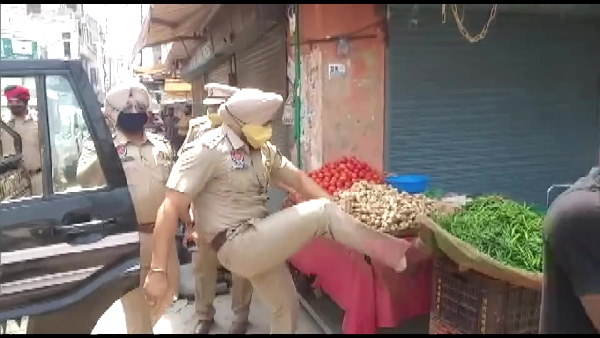Punjab Phagwara SHO kicking the roadside vegetables cart, video goes to viral, suspended Punjab Phagwara SHO kicking the roadside vegetables cart, video goes to viral, suspended