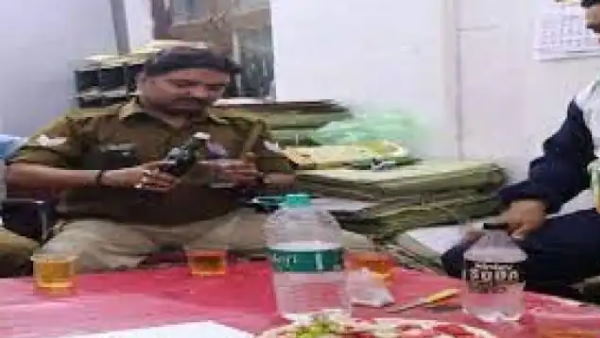 etawah head constable suspended after photos of liquor party in ssp office goes viral etawah head constable suspended after photos of liquor party in ssp office goes viral