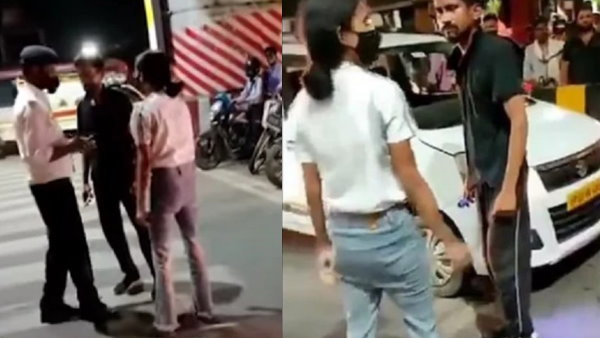 पुलिसवालों के सामने कैब ड्राइवर की पिटाई