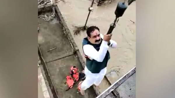 madhya pradesh home minister narottam mishra stuck in flood at datia airlifted by airforce madhya pradesh home minister narottam mishra stuck in flood at datia airlifted by airforce
