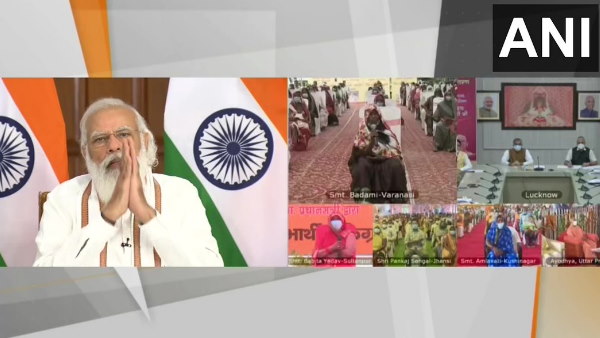 PM Modi interacts with beneficiaries of Pradhan Mantri Garib Kalyan Anna Yojana in Uttar Pradesh PM Modi interacts with beneficiaries of Pradhan Mantri Garib Kalyan Anna Yojana in Uttar Pradesh
