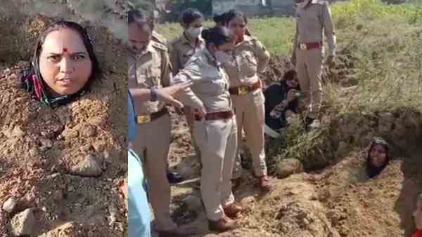 agra news: woman buried herself in a pit to save land agra news: woman buried herself in a pit to save land
