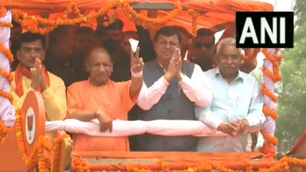 Champawat By-Election: CM Pushkar Singh Dhami holds a roadshow along with UP CM Yogi Adityanath in Tanakpur Champawat By-Election: CM Pushkar Singh Dhami holds a roadshow along with UP CM Yogi Adityanath in Tanakpur