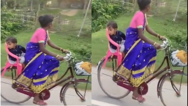 साइकिल में पीछे एक कुर्सी फिट कर दी