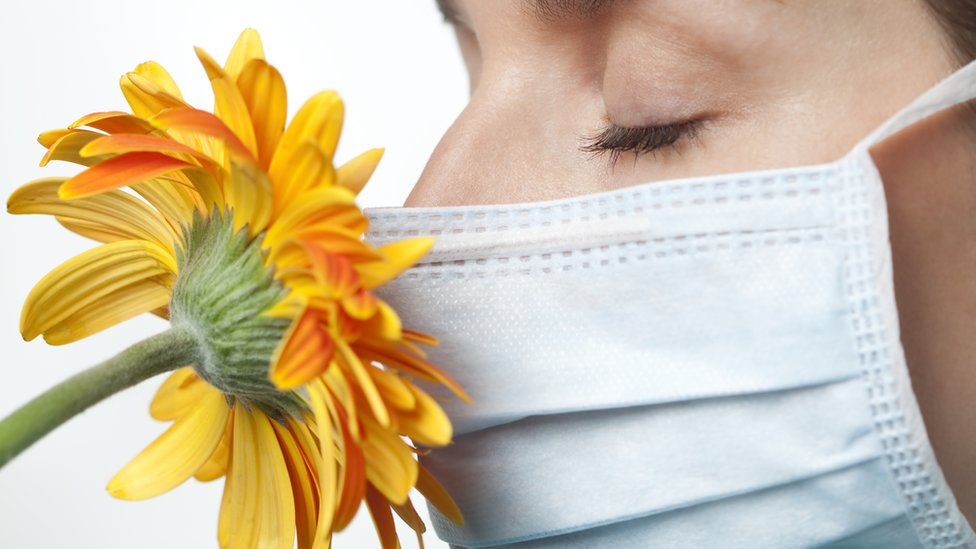 Woman wearing surgical mask Woman wearing surgical mask