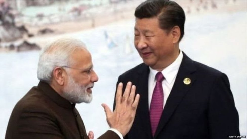 नरेंद्र मोदी और शी जिनपिंग नरेंद्र मोदी और शी जिनपिंग